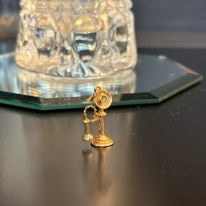 Vintage candle stick telephone charm
Necklace Bracelet